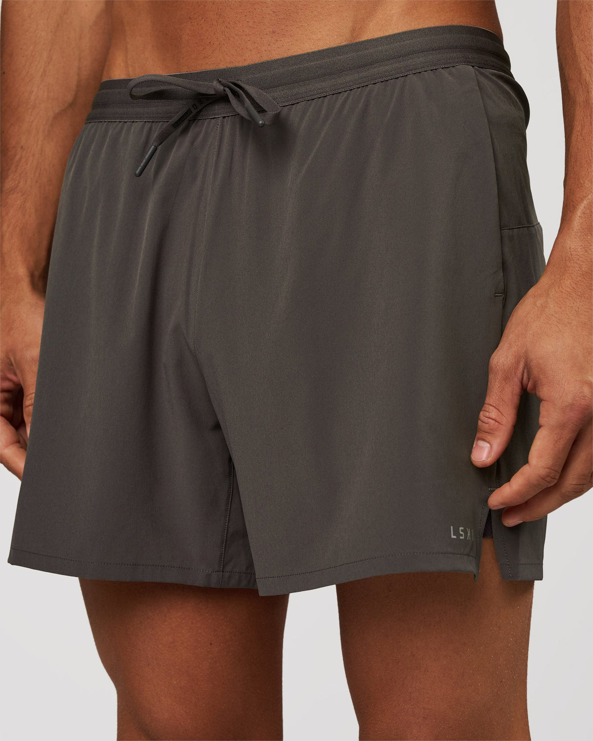 Man wearing Pace 5" Lined Running Short - Dark Storm | Model:Albert | Size:M