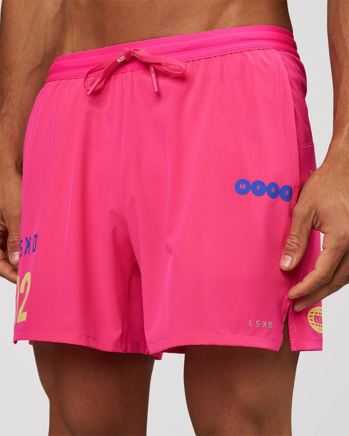 Man wearing Pace 5" Lined Running Short - Game Plan Ultra Pink | Model:Albert | Size:M