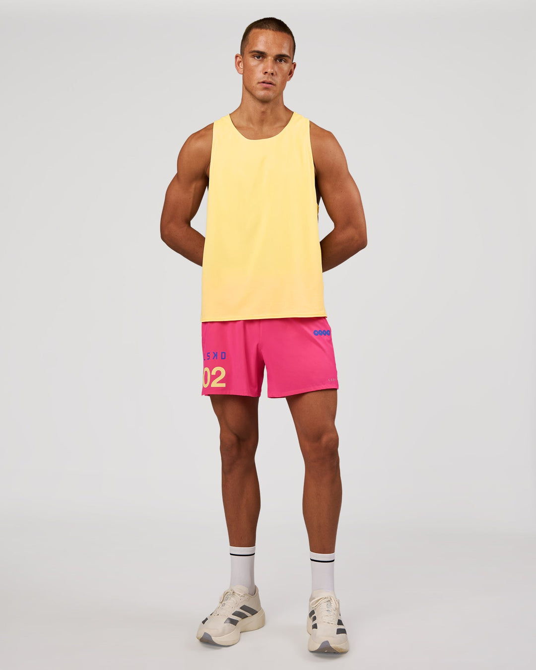 Man wearing Pace 5" Lined Running Short - Game Plan Ultra Pink | Model:Albert | Size:M - view 3