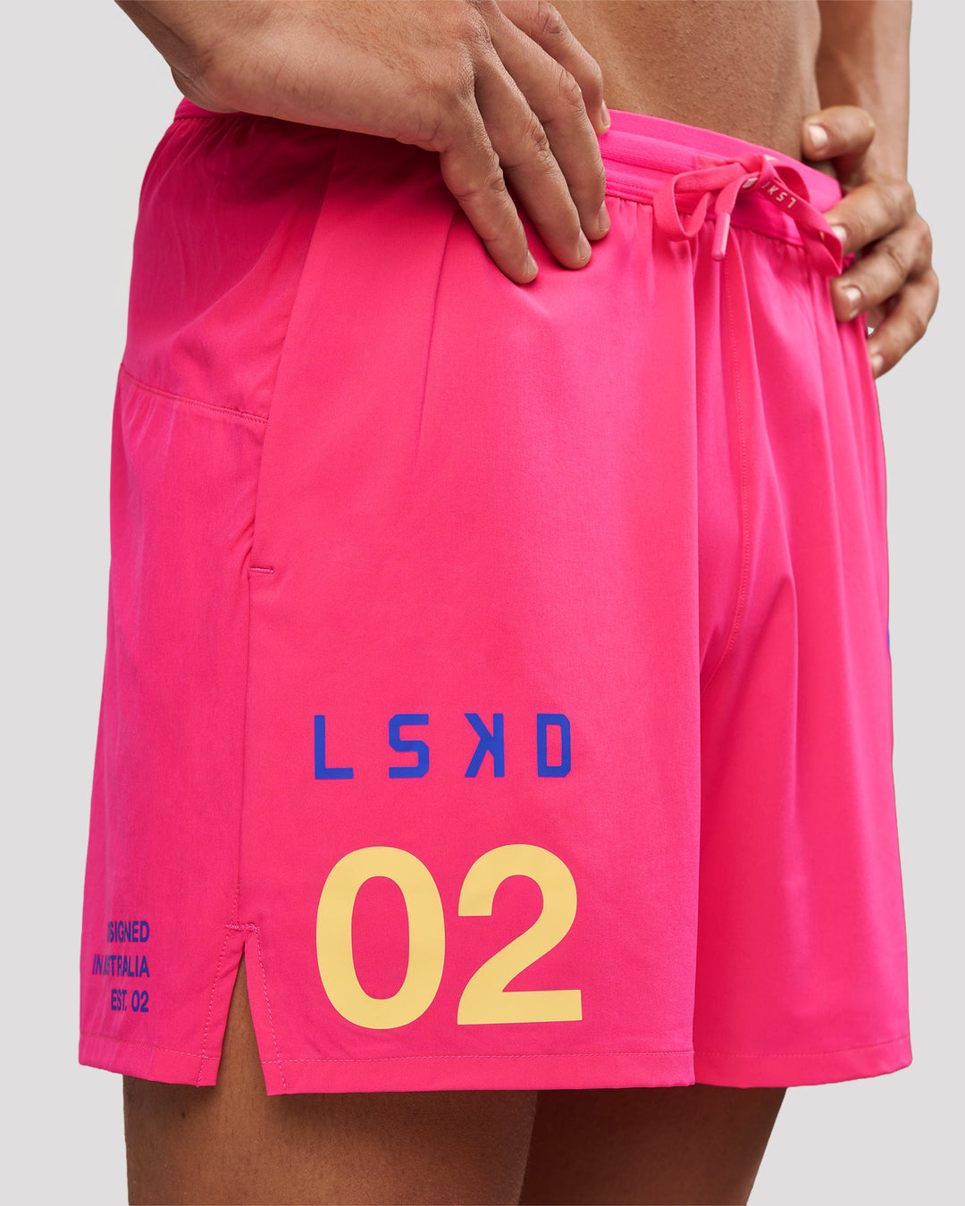 Man wearing Pace 5" Lined Running Short - Game Plan Ultra Pink | Model:Albert | Size:M - view 11