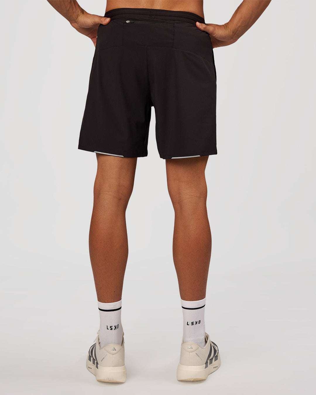 Man wearing Pace 7" Lined Running Short - Black-Reflective | Model:Albert | Size:M - view 5