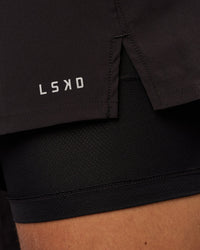 Man wearing Pace 7" Lined Running Short - Black-Reflective | Model:Albert | Size:M | Thumbnail Index: 3