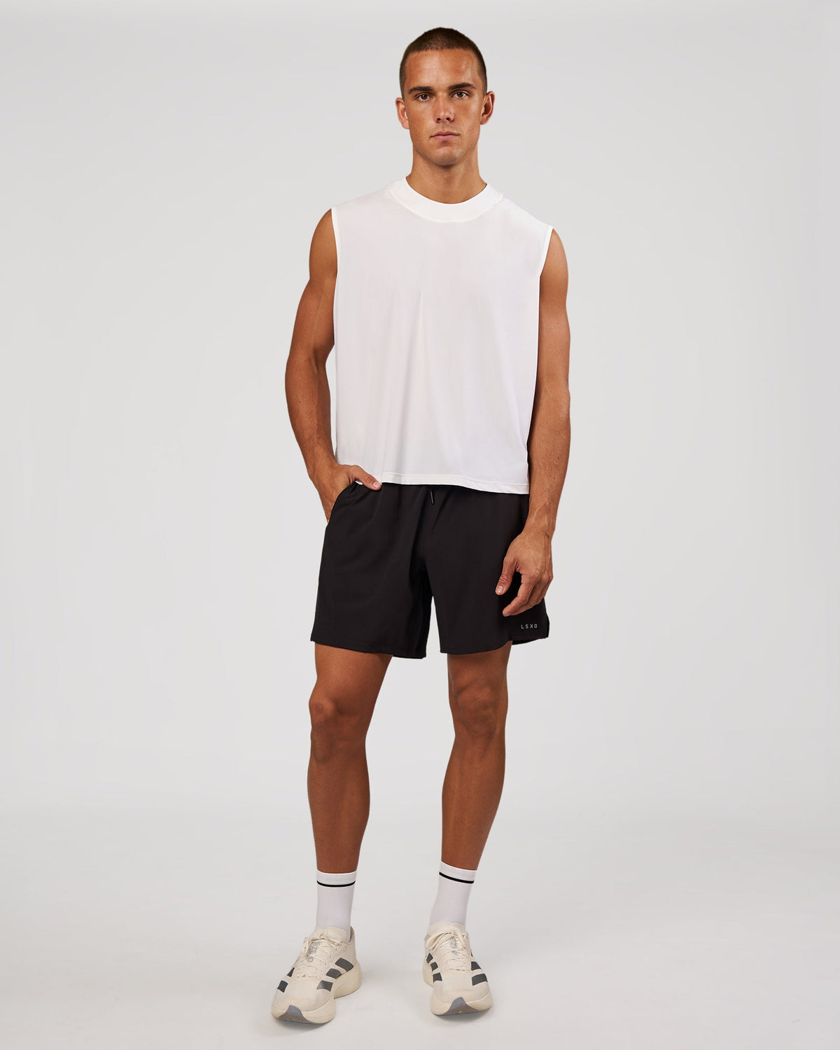 Man wearing Pace 7" Lined Running Short - Black-Reflective | Model:Albert | Size:M - view 2