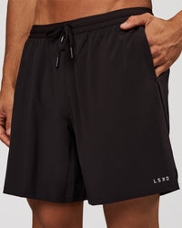 Man wearing Pace 7" Lined Running Short - Black-Reflective | Model:Albert | Size:M | Thumbnail Index: 0