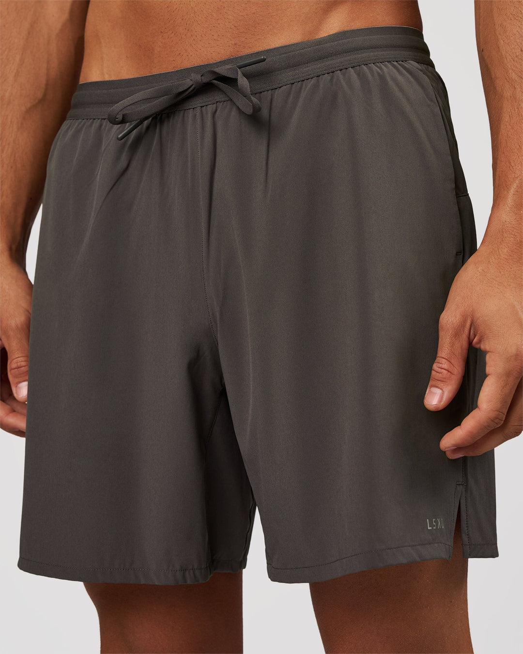 Man wearing Pace 7" Lined Running Short - Dark Storm | Model:Albert | Size:M - view 1
