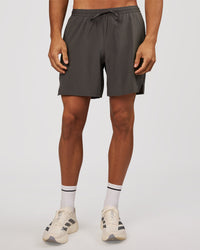 Man wearing Pace 7" Lined Running Short - Dark Storm | Model:Albert | Size:M | Thumbnail Index: 2