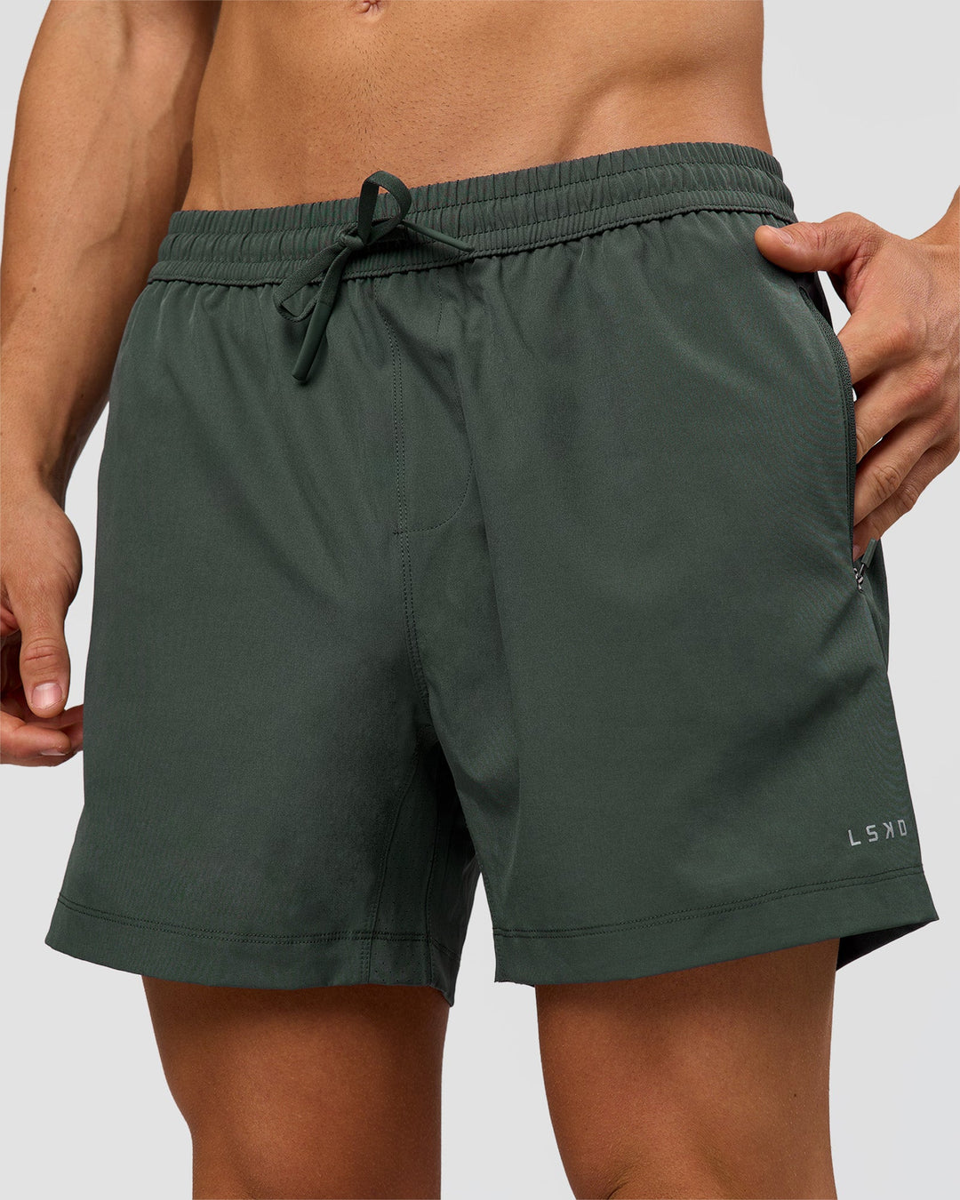 Man wearing Rep 5" Performance Short - Carbon Green | Model:Albert | Size:M - view 1