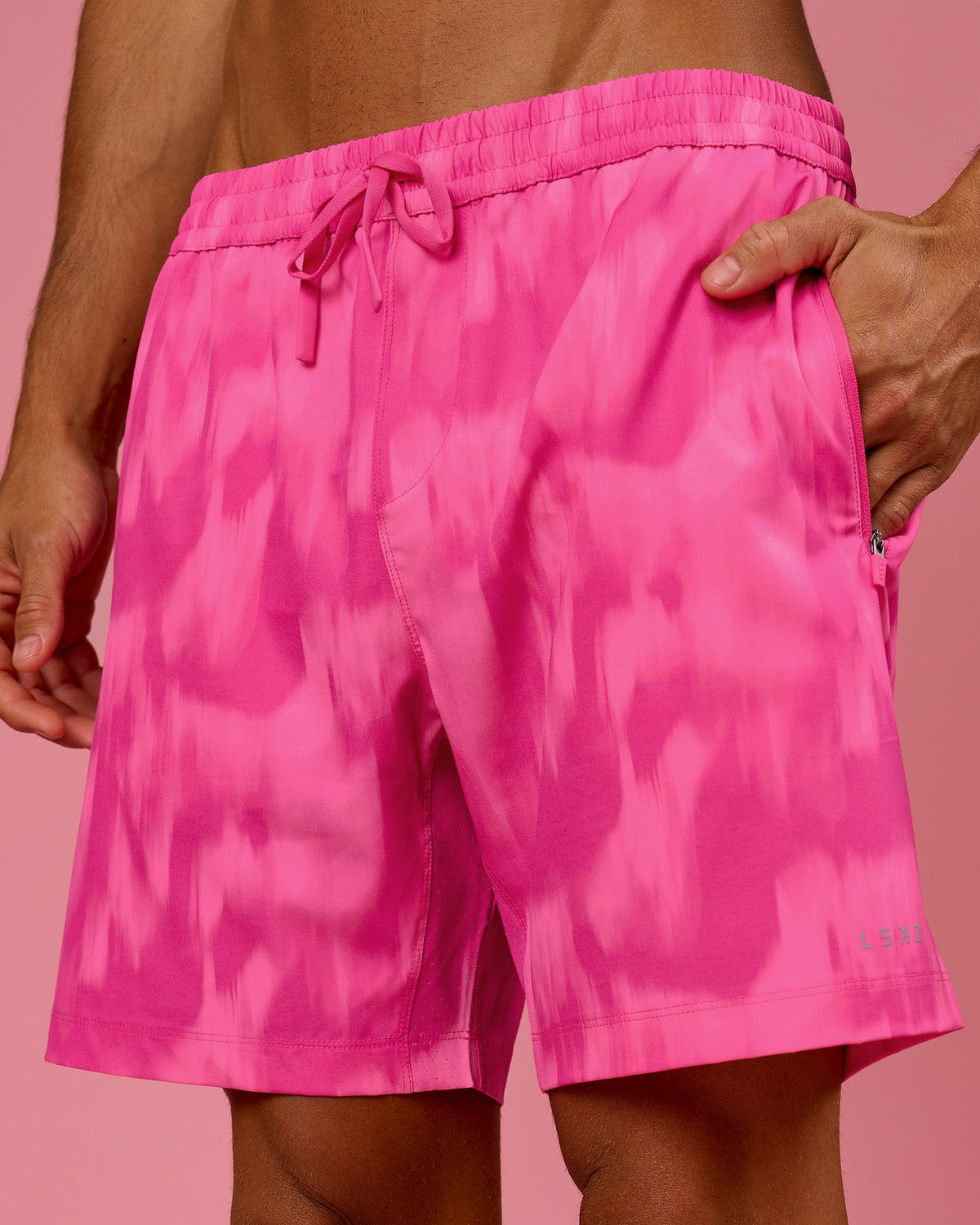 Man wearing Rep 7" Performance Short - Radiant Pink | Model:Albert | Size:M - view 1