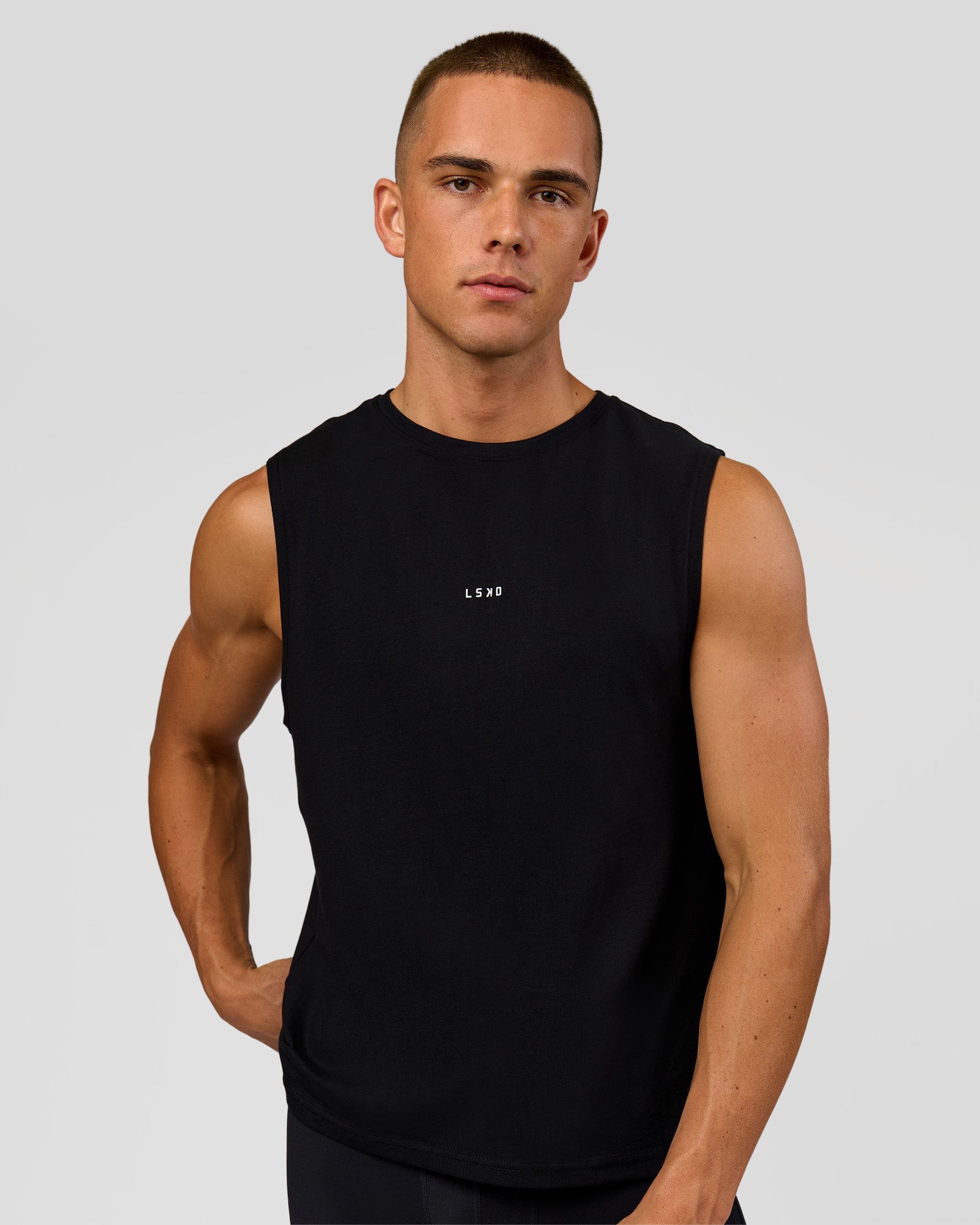 Man wearing Run Club FLXCotton Tank - Black-Electric Indigo | Model:Albert | Size:M