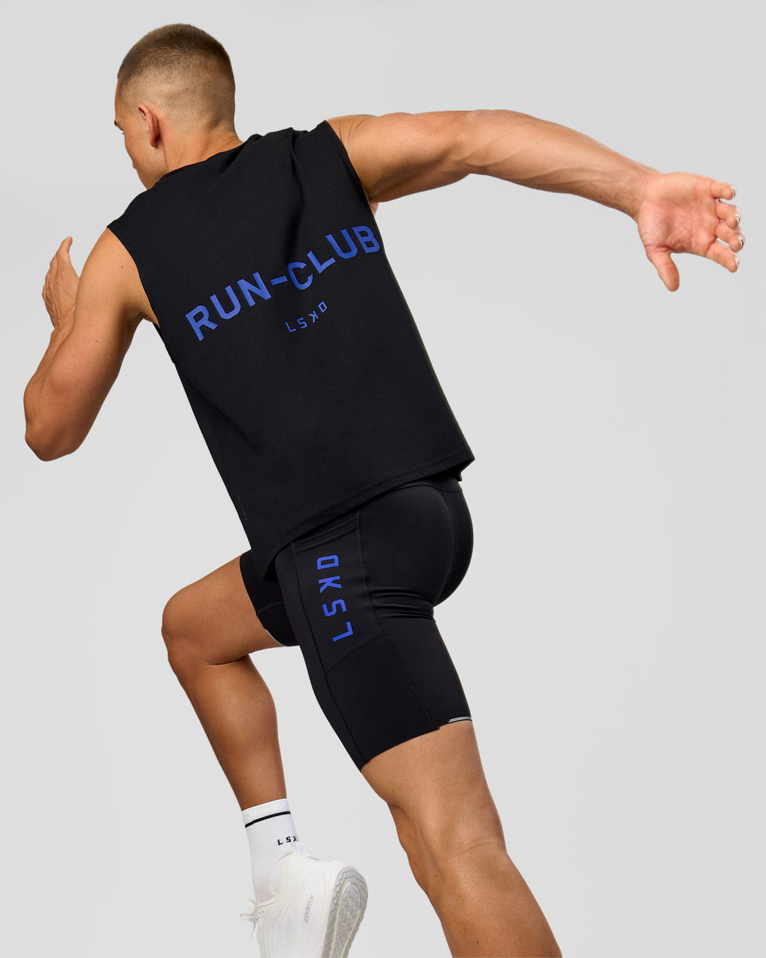 Man wearing Run Club FLXCotton Tank - Black-Electric Indigo | Model:Albert | Size:M - view 3