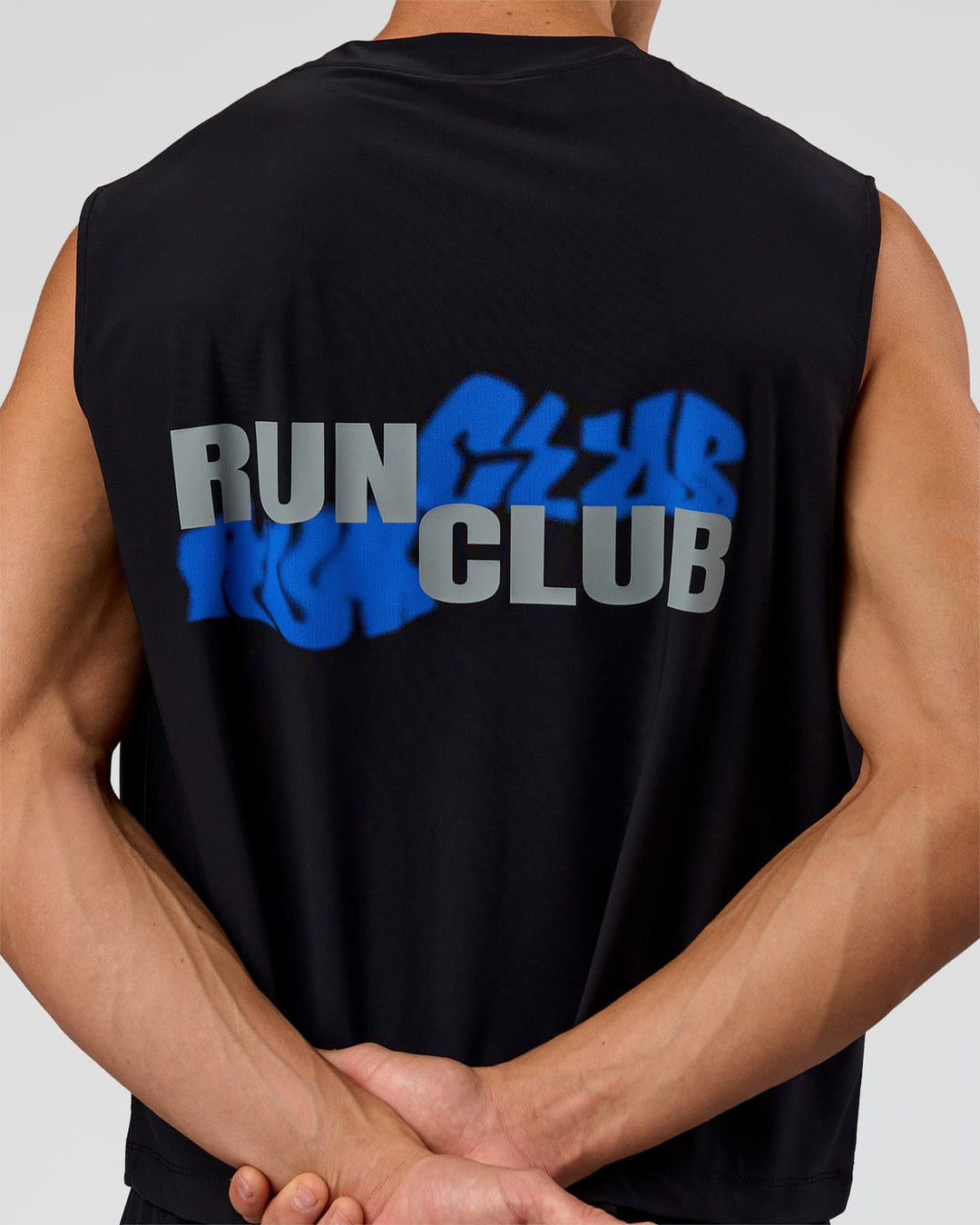 Man wearing Run Club Elevate Muscle Tank - Black-Electric Indigo | Model:Albert | Size:M - view 9