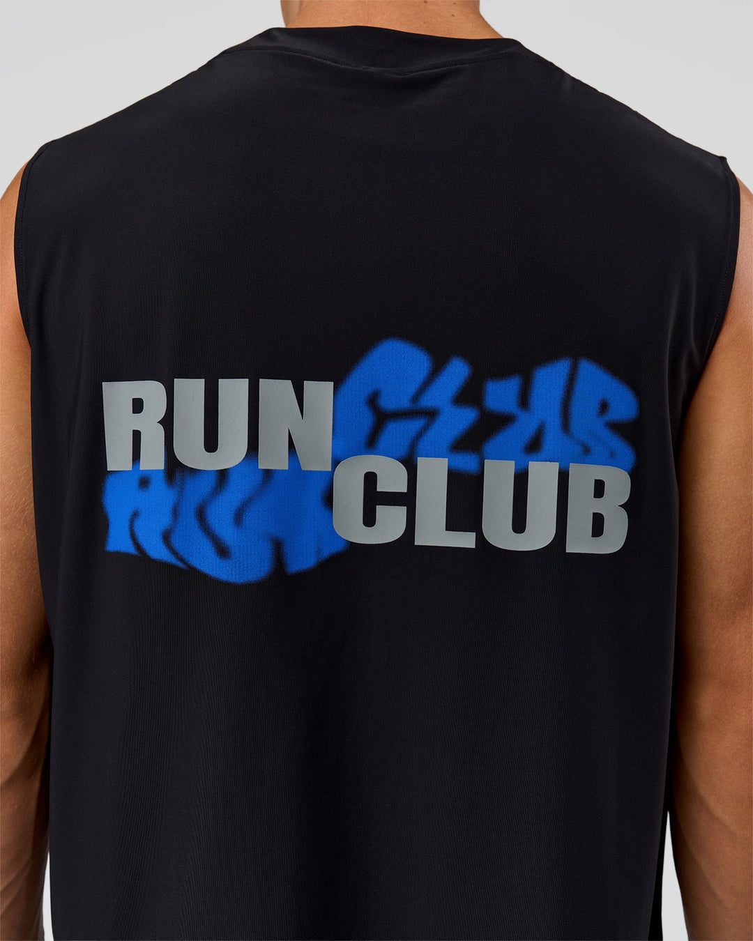 Man wearing Run Club Elevate Muscle Tank - Black-Electric Indigo | Model:Albert | Size:M - view 10