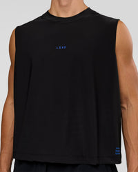 Man wearing Run Club Elevate Muscle Tank - Black-Electric Indigo | Model:Albert | Size:M | Thumbnail Index: 1