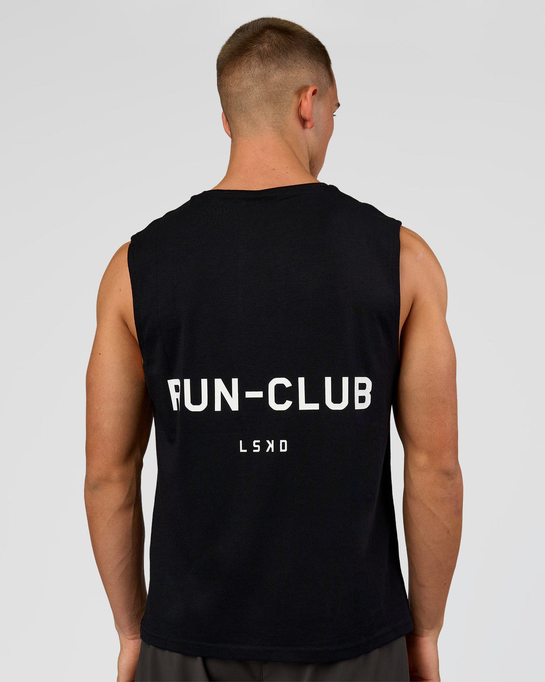 Man wearing Run Club FLXCotton Tank - Black-White | Model:Albert | Size:M - view 1