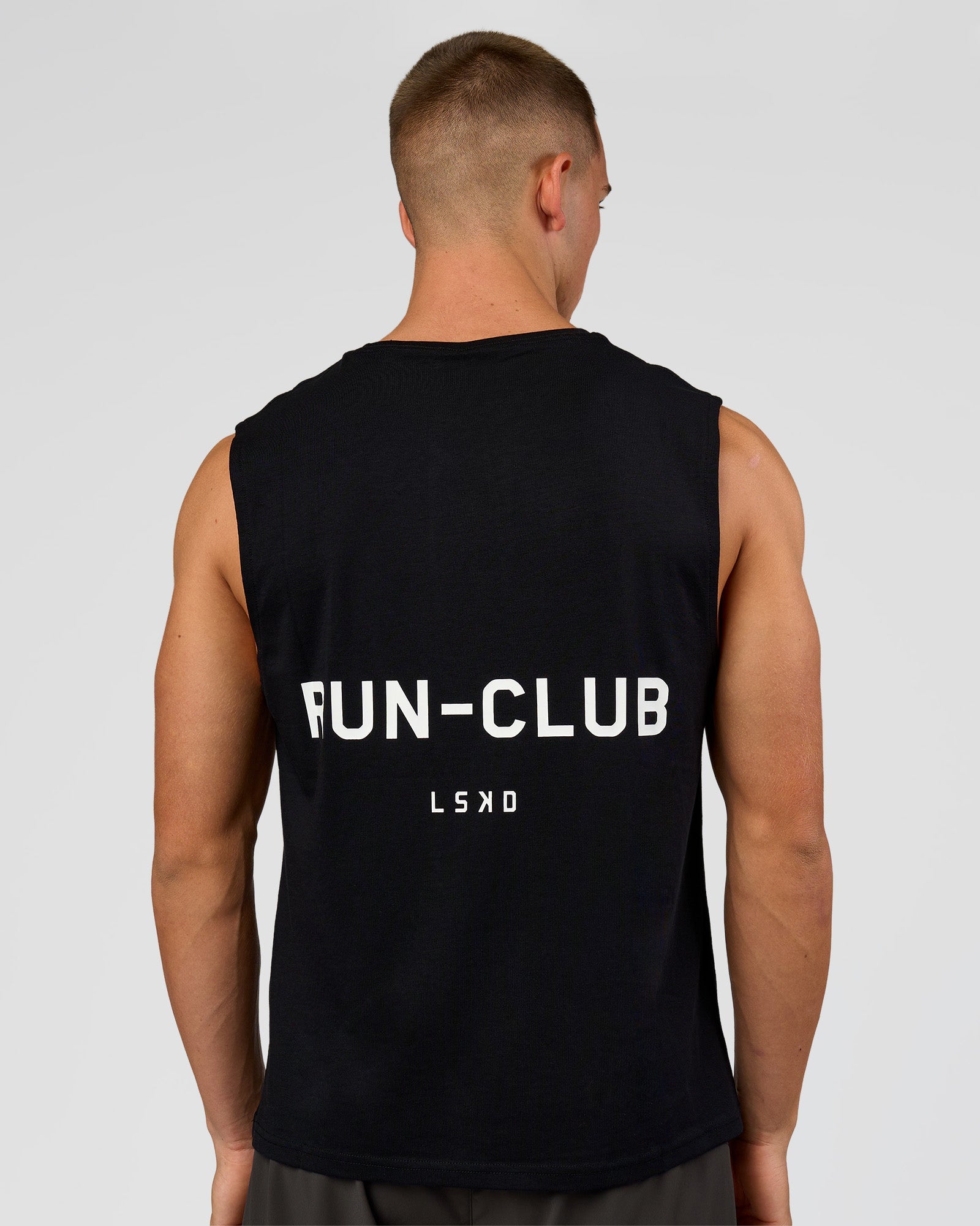 Man wearing Run Club FLXCotton Tank - Black-White | Model:Albert | Size:M