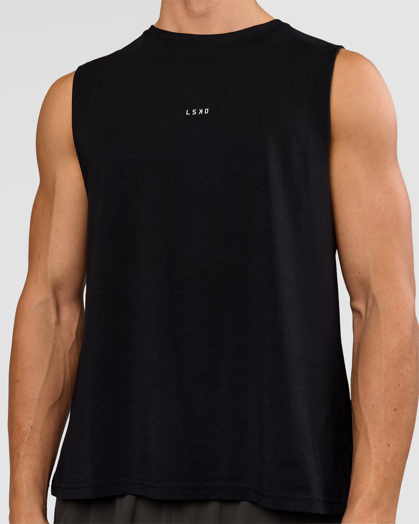 Man wearing Run Club FLXCotton Tank - Black-White | Model:Albert | Size:M