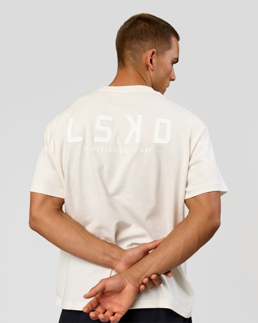 Man wearing Tonal Legacy Heavyweight Oversized Tee - Off White-Off White | Model:Albert | Size:M - view 2