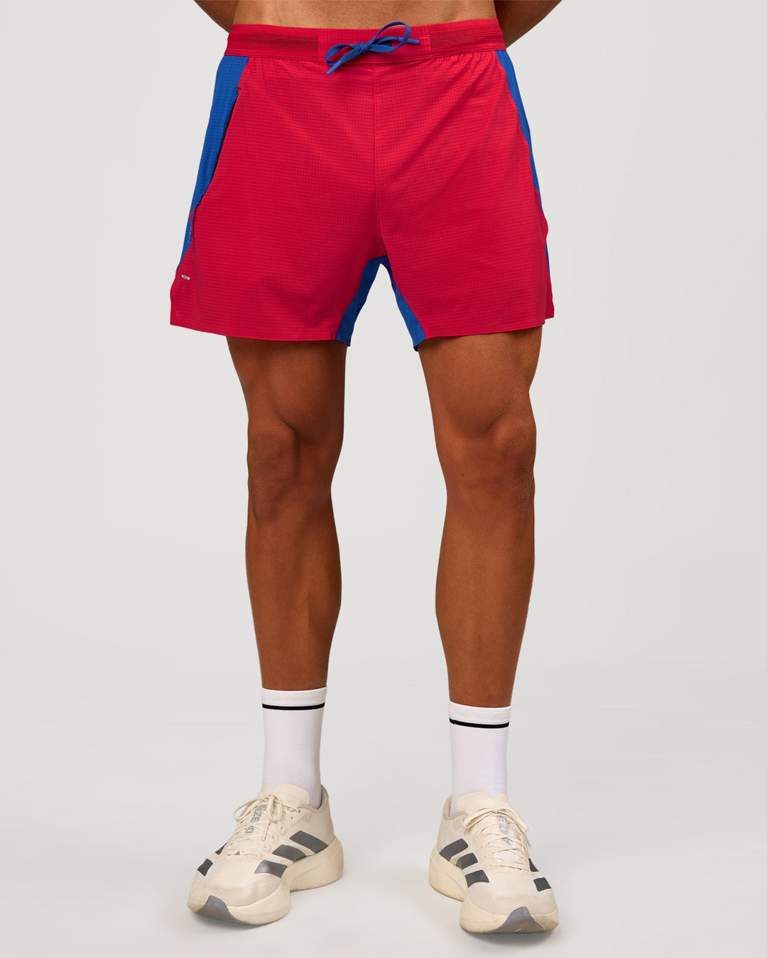 Man wearing UltraAir 5" Lined Performance Short - Scarlet-Electric Indigo | Model: Albert | Size: M - view 6