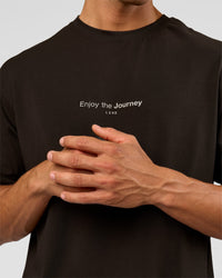 Man wearing VS1 Enjoy The Journey FLXCotton Oversize Tee - Ground Coffee | Model:Albert | Size:M | Thumbnail Index: 10