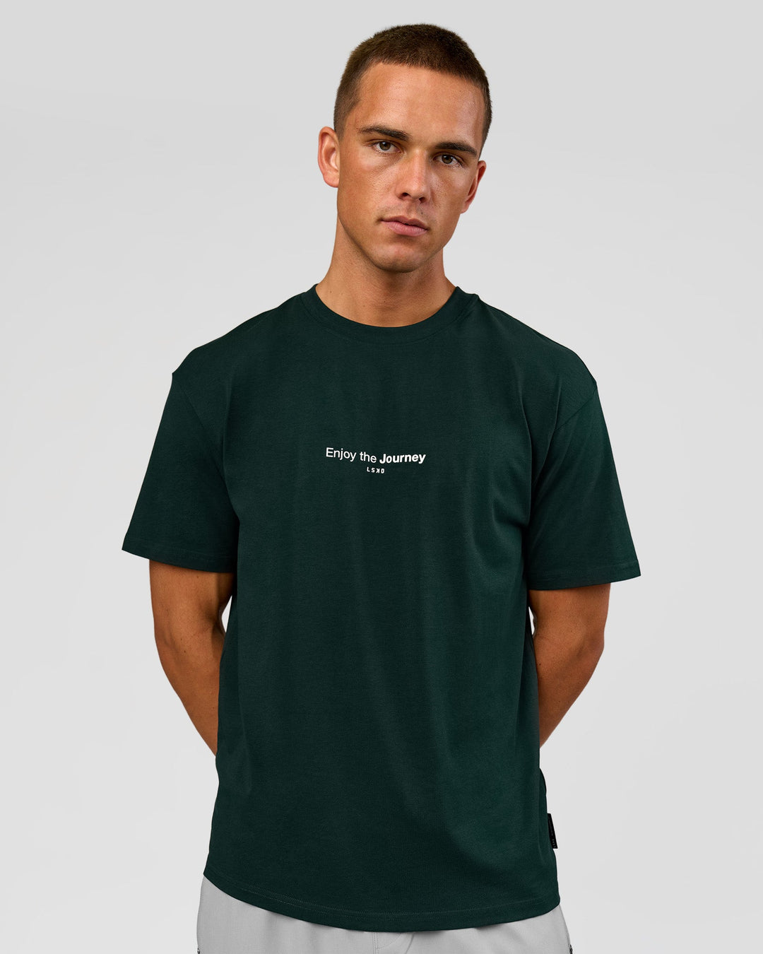 Man wearing VS1 Enjoy The Journey FLXCotton Oversize Tee - Midnight Green | Model:Albert | Size:M - view 2