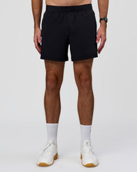 Man wearing Rep+ 5” Training Short - Black | Model:Alex | Size:M | Thumbnail Index: 2