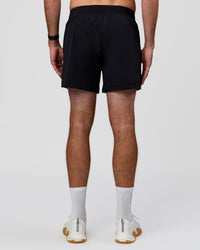 Man wearing Rep+ 5” Training Short - Black | Model:Alex | Size:M | Thumbnail Index: 4