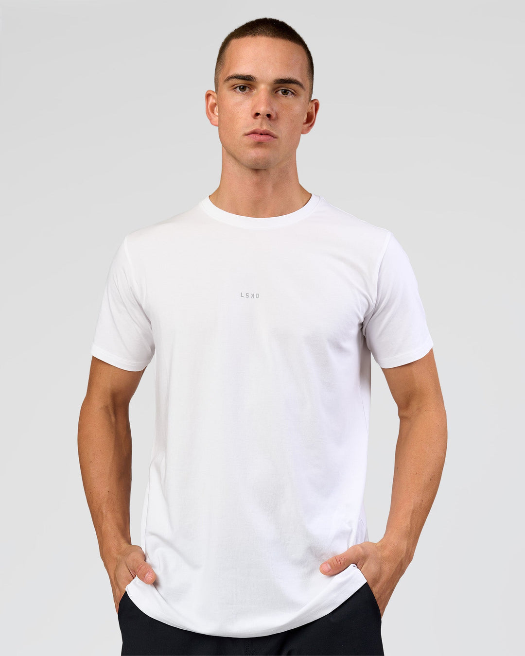 Man wearing Base FLXCotton Tee - White | Model:Base | Size:M - view 1