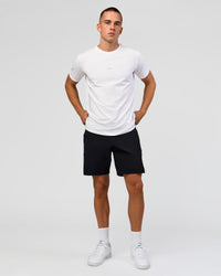 Man wearing Base FLXCotton Tee - White | Model:Base | Size:M | Thumbnail Index: 1