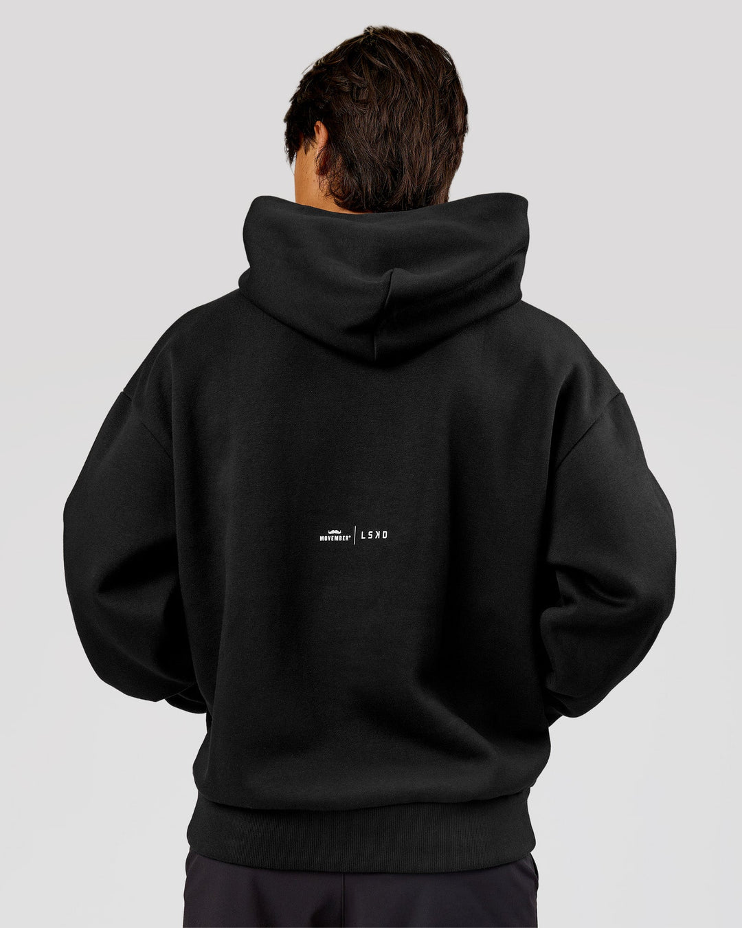 Man wearing Movember x LSKD Oversized Hoodie - Black | Model:George | Size:M - view 4