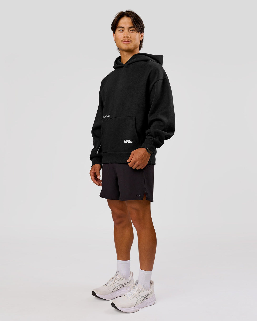 Man wearing Movember x LSKD Oversized Hoodie - Black | Model:George | Size:M - view 7