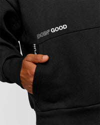 Man wearing Movember x LSKD Oversized Hoodie - Black | Model:George | Size:M | Thumbnail Index: 10