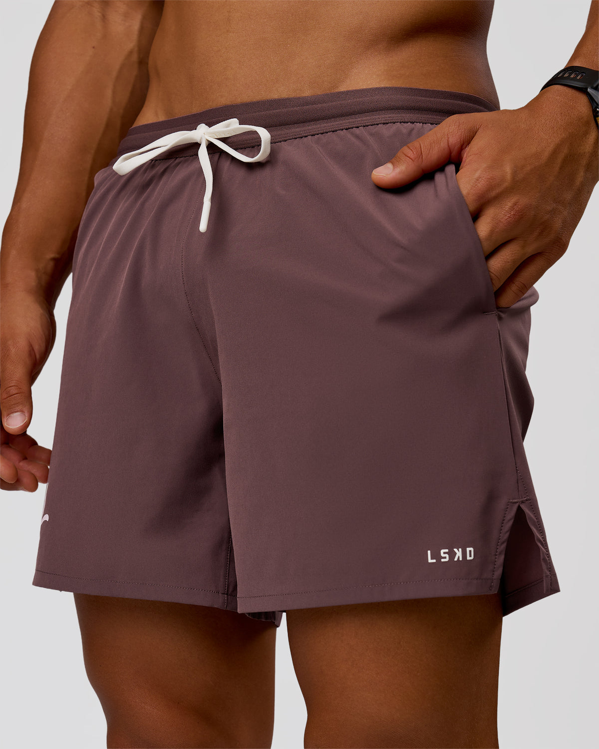 Man wearing Pace 5" Lined Running Short - Cocoa Powder-Off White | Model:George | Size:M - view 1