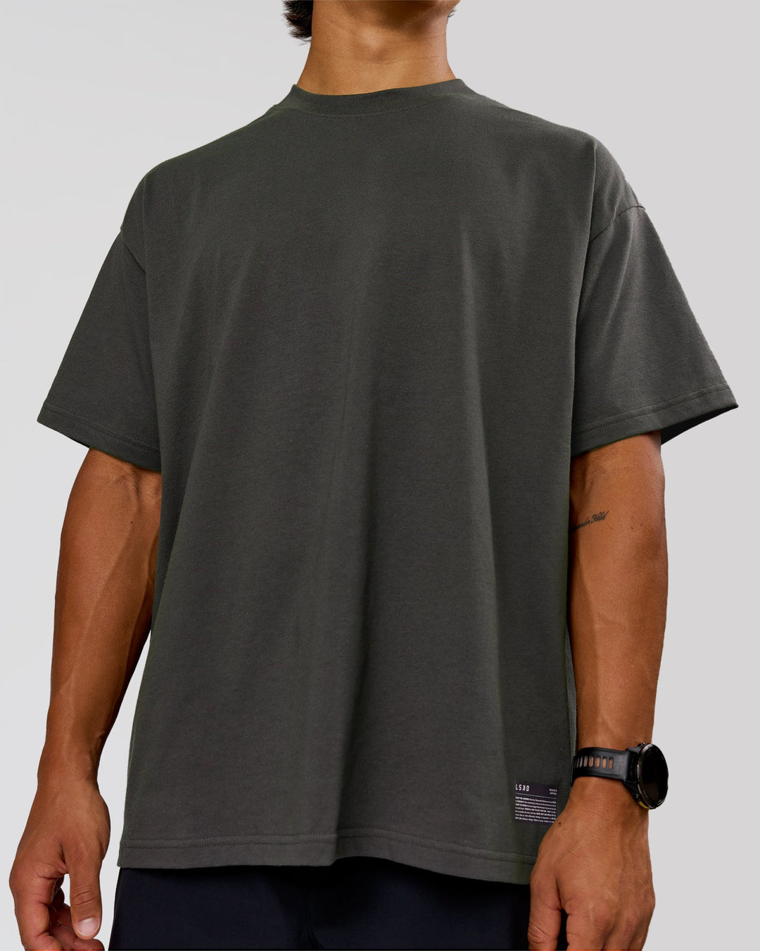 Man wearing Strata Heavyweight Oversized Tee - Onyx | Model:George | Size:M - view 6