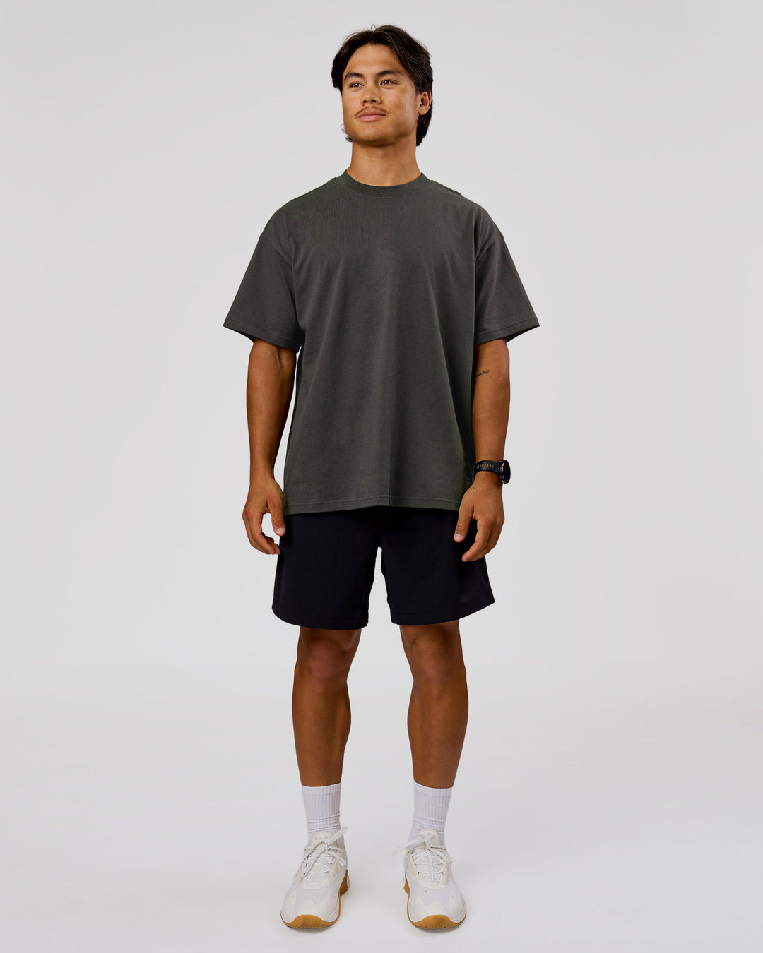 Man wearing Strata Heavyweight Oversized Tee - Onyx | Model:George | Size:M - view 4