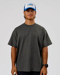 Man wearing Strata Heavyweight Oversized Tee - Onyx | Model:George | Size:M