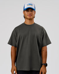 Man wearing Strata Heavyweight Oversized Tee - Onyx | Model:George | Size:M | Thumbnail Index: 0