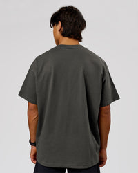 Man wearing Strata Heavyweight Oversized Tee - Onyx | Model:George | Size:M | Thumbnail Index: 2