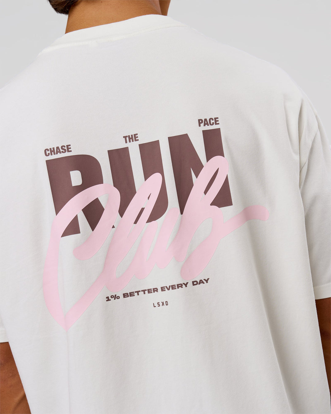 Man wearing Run Club Unisex Oversized Heavyweight FLXCotton Tee - Off White | Model:George | Size:M - view 7