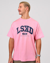 Man wearing Varsity EST Heavyweight Oversized Tee  - Pink Rose-Future Navy | Model:Jaiden | Size:M | Thumbnail Index: 7