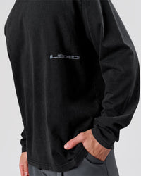 Man wearing Backline Washed Heavyweight Oversized LS Tee - Black Washed | Model:Leandro | Size:M | Thumbnail Index: 2