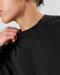 Man wearing Backline Washed Heavyweight Oversized LS Tee - Black Washed | Model:Leandro | Size:M | Thumbnail Index: 4
