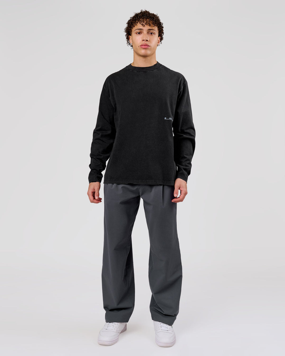 Man wearing Backline Washed Heavyweight Oversized LS Tee - Black Washed | Model:Leandro | Size:M - view 15