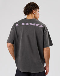 Man wearing Backline Washed Heavyweight Oversized Tee - Asphalt Washed | Model:Leandro | Size:M | Thumbnail Index: 0