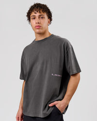 Man wearing Backline Washed Heavyweight Oversized Tee - Asphalt Washed | Model:Leandro | Size:M | Thumbnail Index: 2