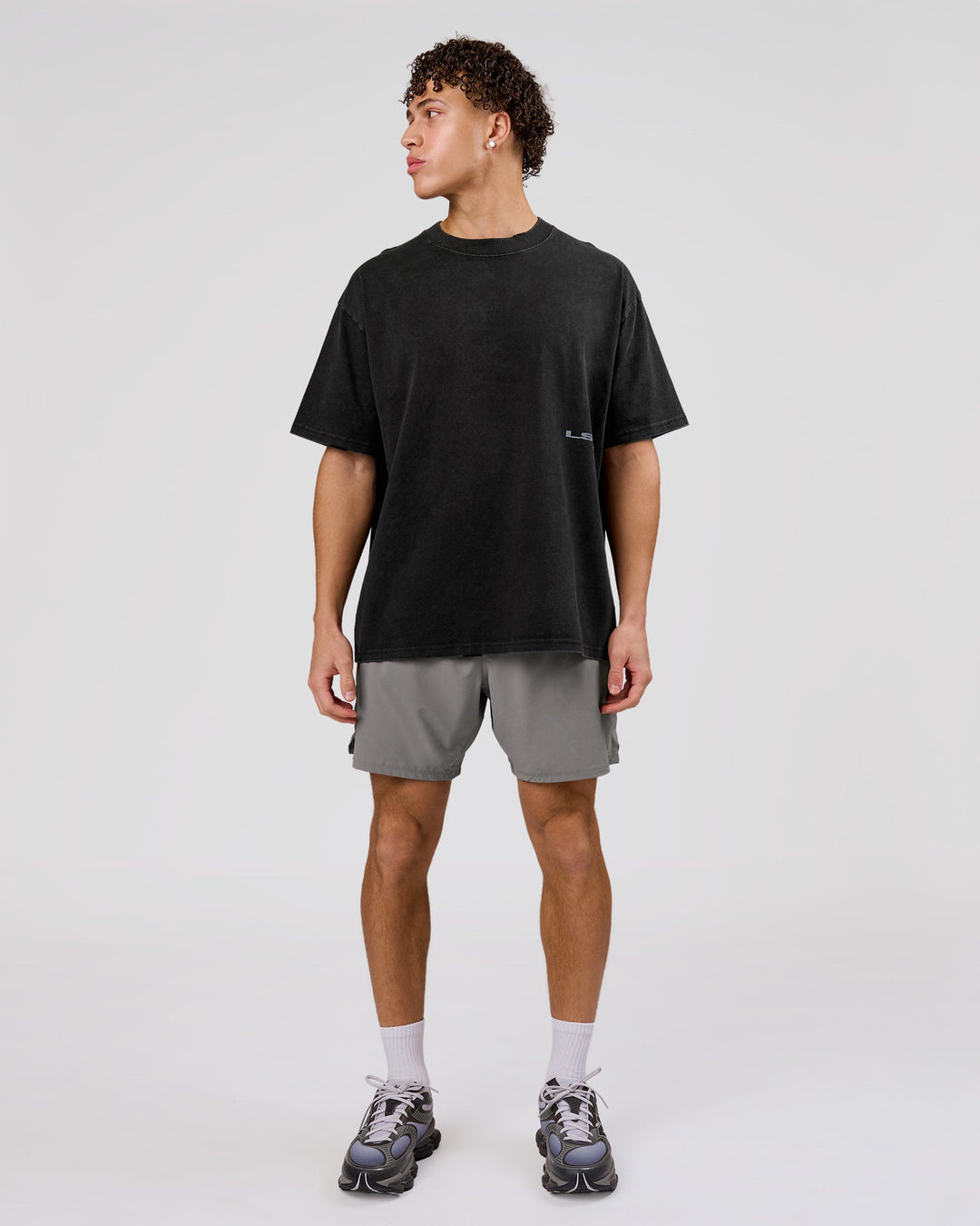 Man wearing Backline Washed Heavyweight Oversized Tee - Black Washed | Model:Leandro | Size:M - view 6
