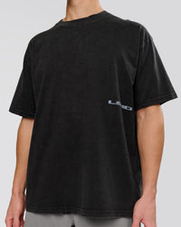 Man wearing Backline Washed Heavyweight Oversized Tee - Black Washed | Model:Leandro | Size:M | Thumbnail Index: 13