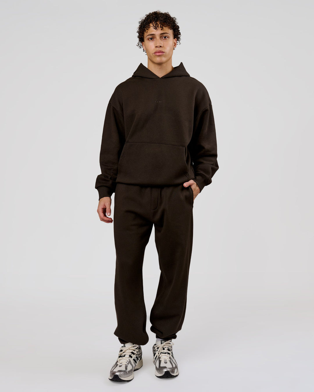 Man wearing Base Baggy Cuffed Track Pant - Ground Coffee | Model:Leandro | Size:M - view 2