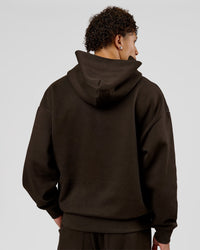 Man wearing Base Oversized Hoodie - Ground Coffee | Model:Leandro | Size:M | Thumbnail Index: 6
