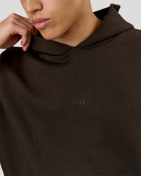 Man wearing Base Oversized Hoodie - Ground Coffee | Model:Leandro | Size:M | Thumbnail Index: 7
