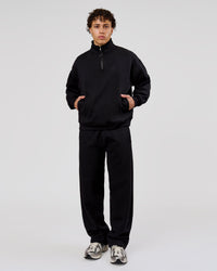 Man wearing Base Quarter Zip Sweater - Black | Model:Leandro | Size:M | Thumbnail Index: 5